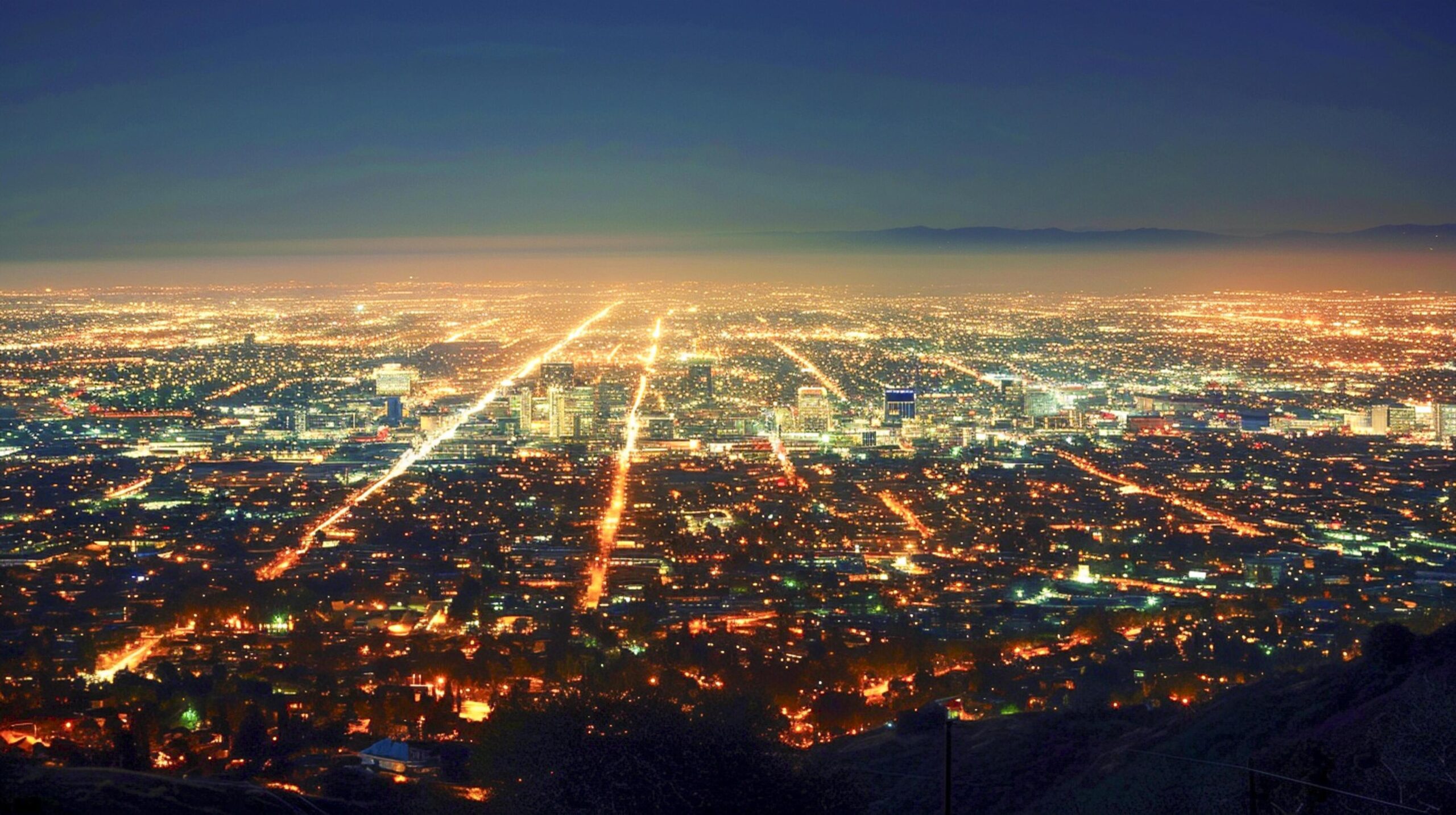 Ai-generated-cityscape-at-night-illuminated-by-thousands-of-lights-ai-generated-free-photo