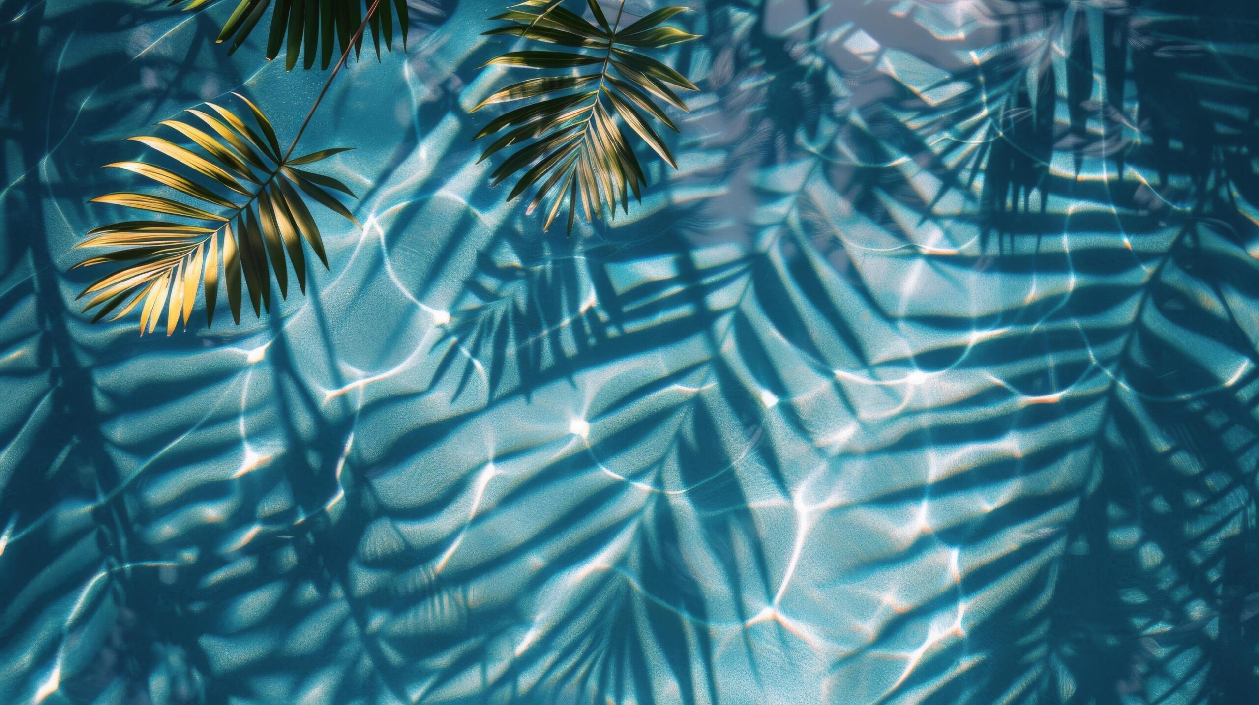 Ai-generated-tropical-pool-with-palm-trees-and-blue-water-free-photo