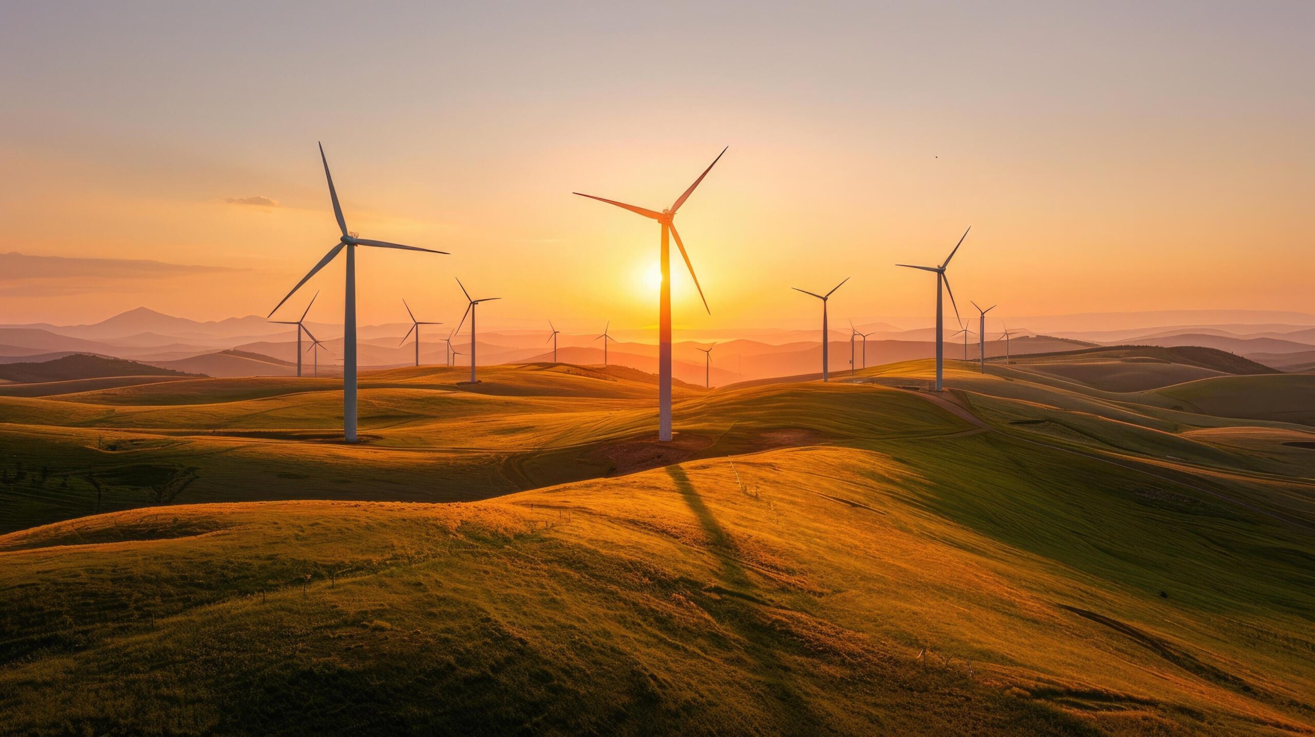Ai-generated-wind-turbines-on-rolling-hills-at-sunrise-with-warm-golden-light-casting-long-shadows-free-photo