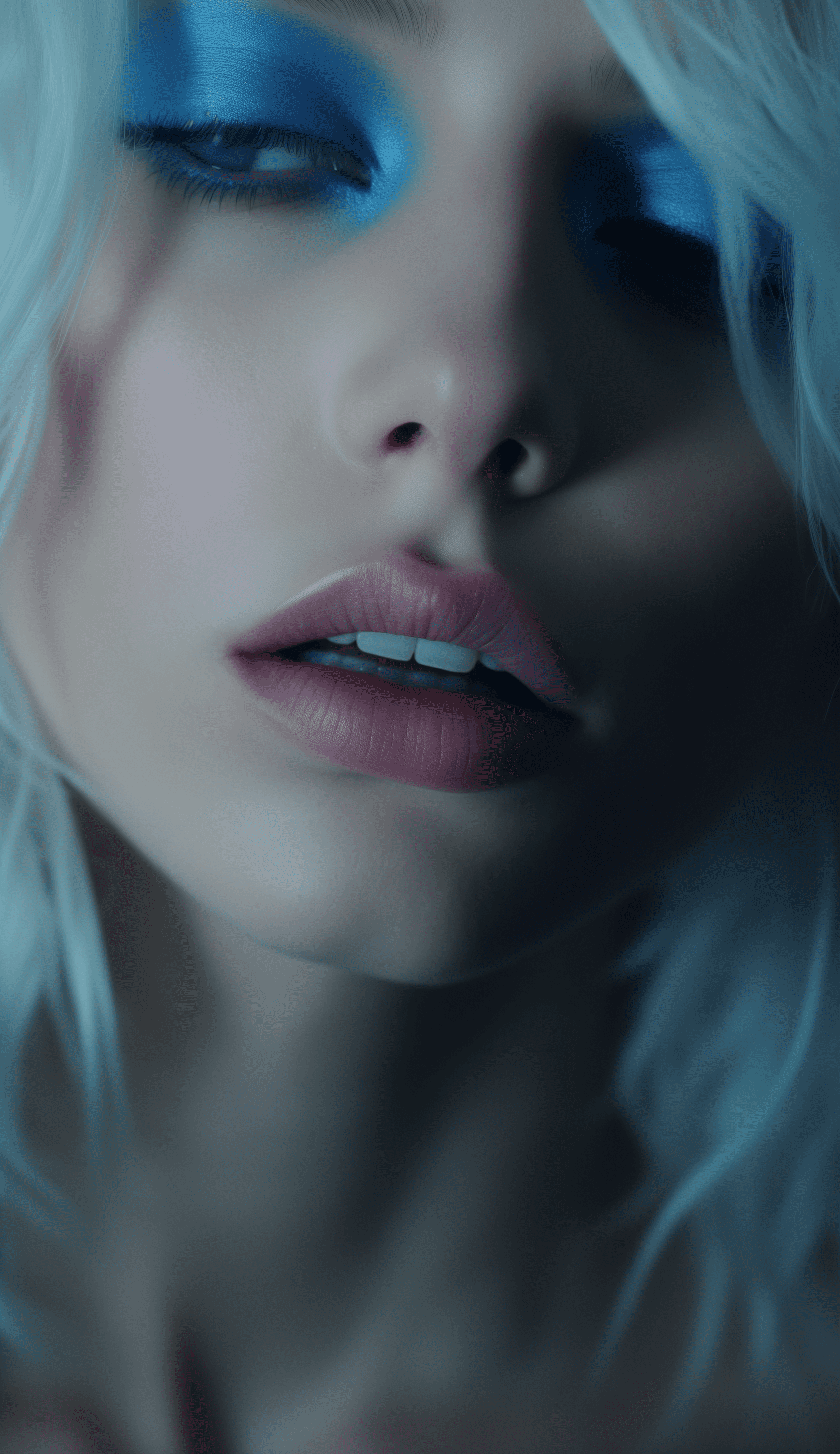 Woman with blonde hair , white makeup and blue eyeshadow, screenshot, screengrab in the style of lev kadash, closeup shot, film grain. --ar 26:45 --v 5. 2 --style raw