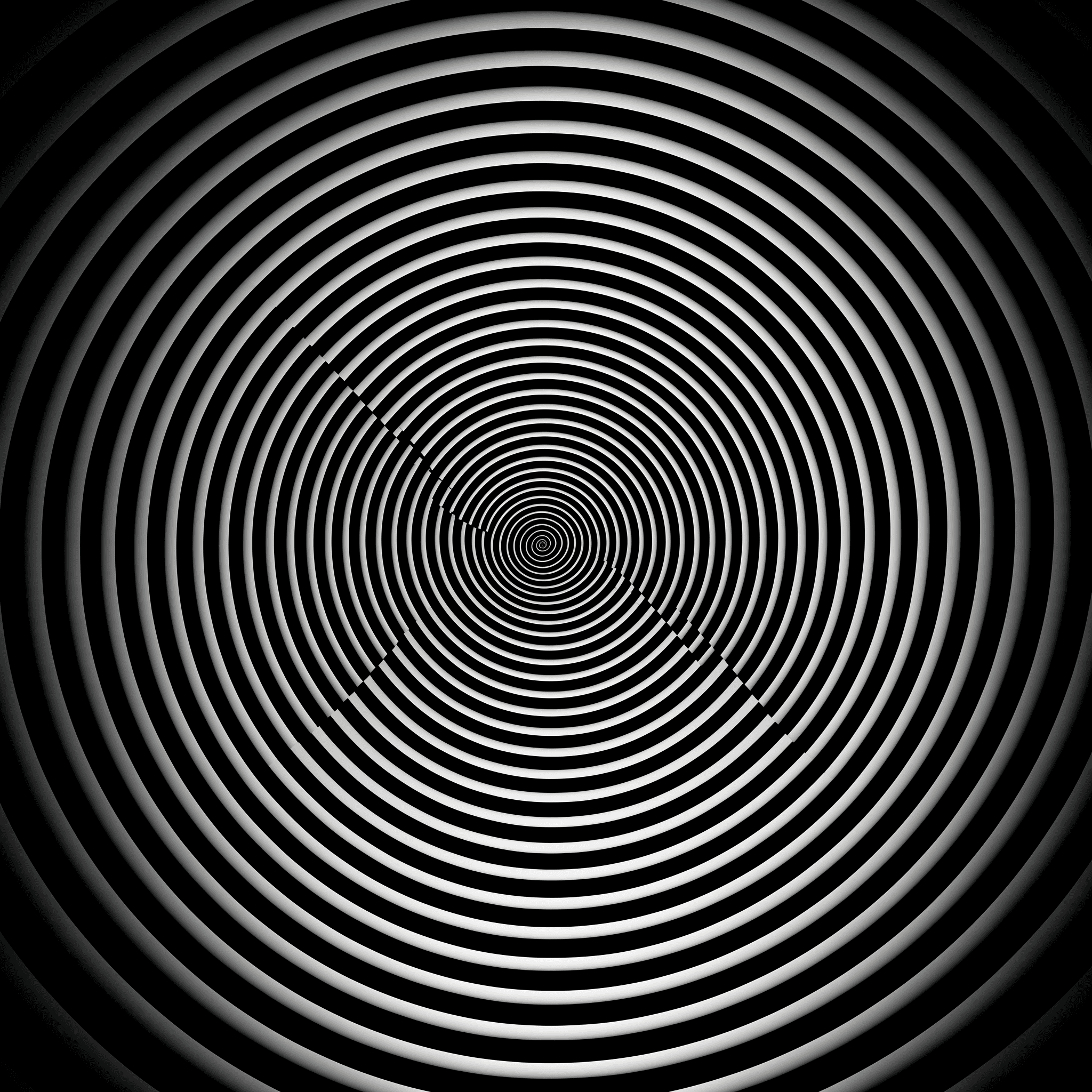 A close up of an optical illusion with concentric circles, creating the impression that they are moving or shimmering in light. The background is dark and simple to highlight these circular patterns. --v 5. 2