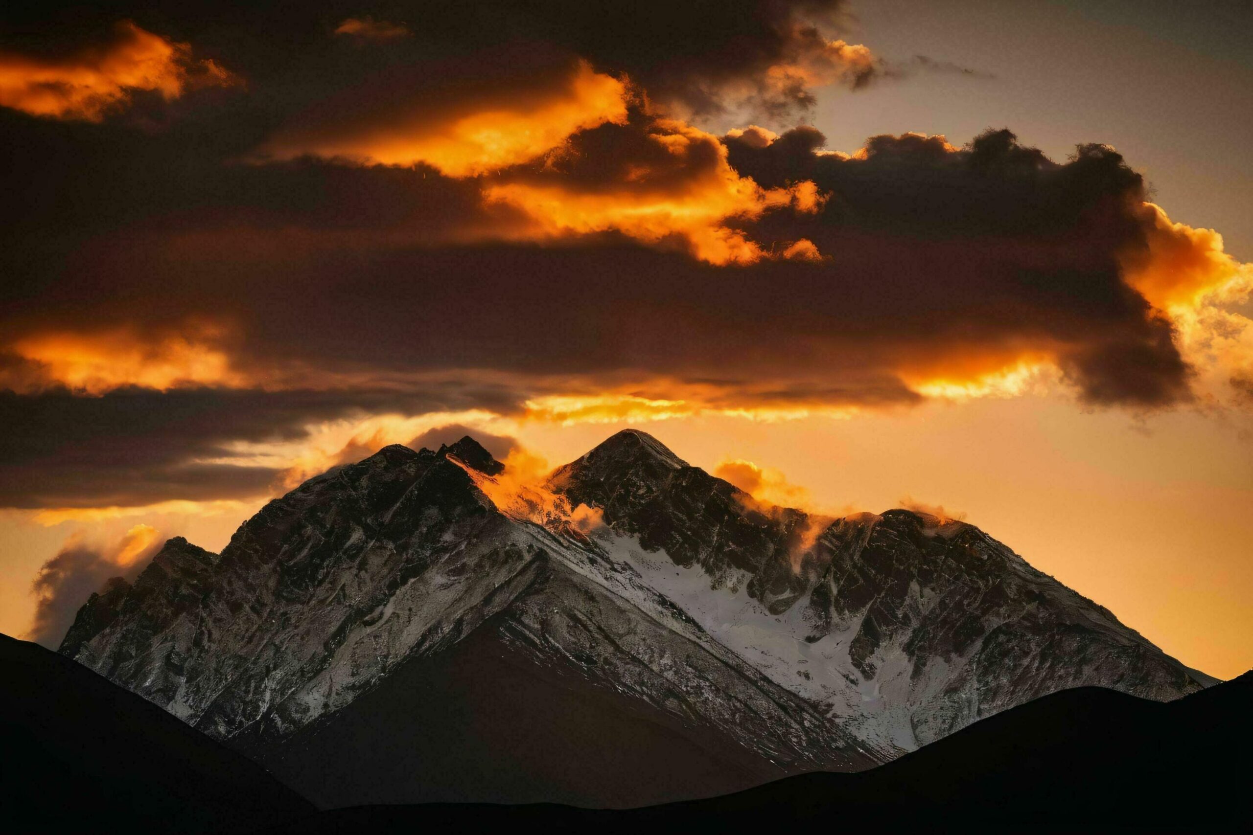 Ai-generated-dramatic-sunset-in-mountain-peaks-free-photo